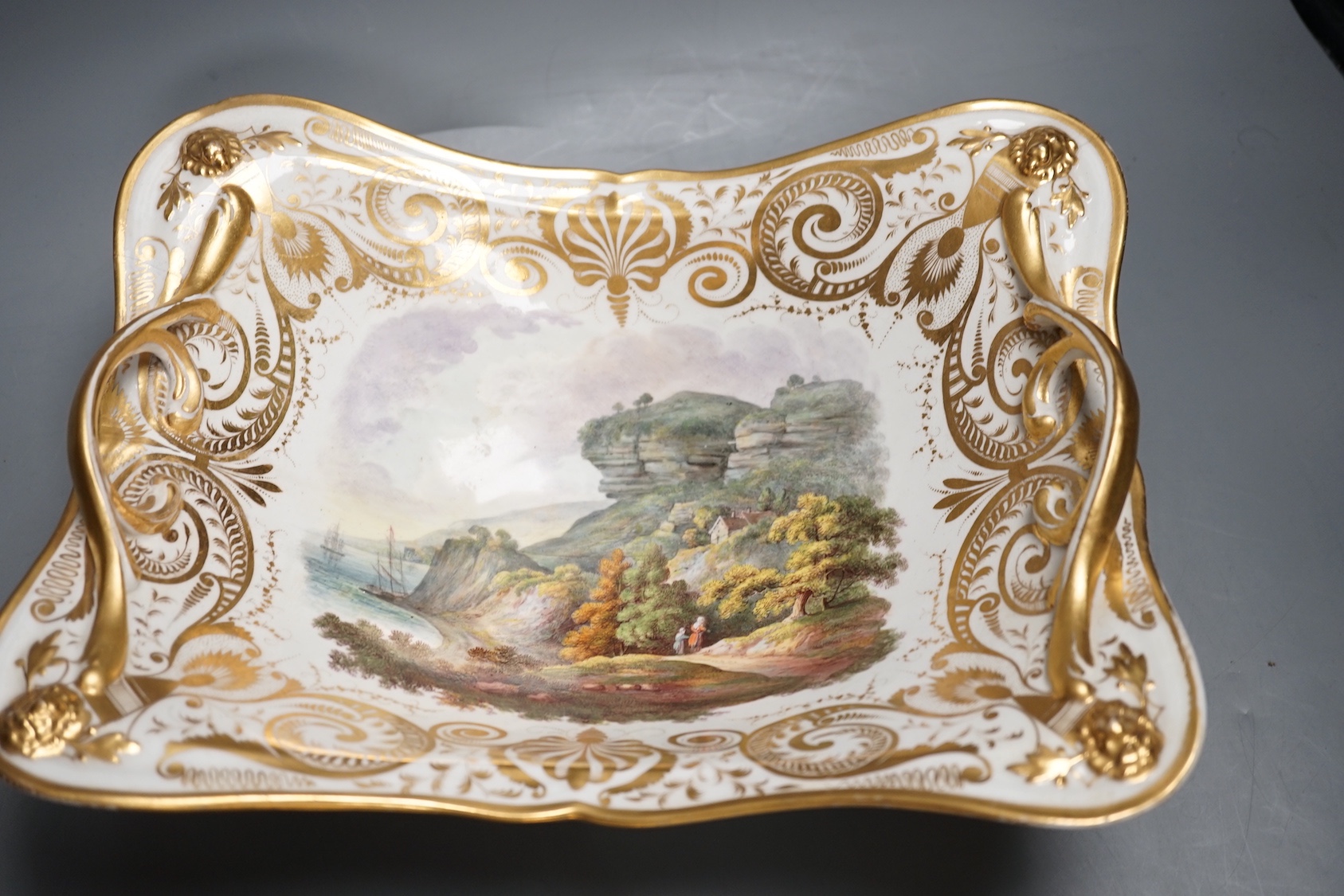 A Derby twin handled dish painted with a 'View in the Isle of Wight' and teapot and cover with two scenes, 'View in Scotland' and 'Near Belmar, Derbyshire c.1815